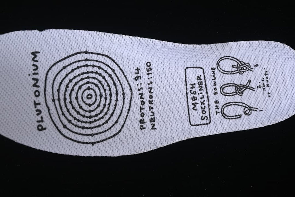 Insole with printed graphics and lace-tying illustrations