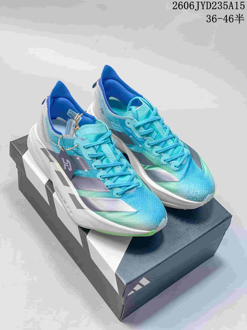 Pair of blue and turquoise Adidas Adizero Adios Pro 4 running shoes on a shoebox