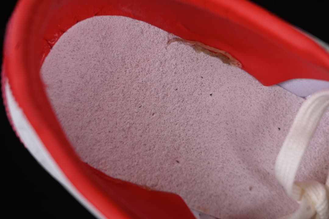 Close-up of the sneaker's red interior lining