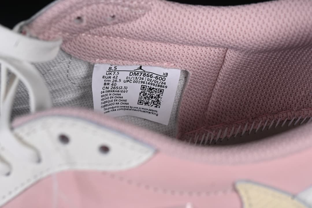 Close-up of the shoe's size and product label inside the collar