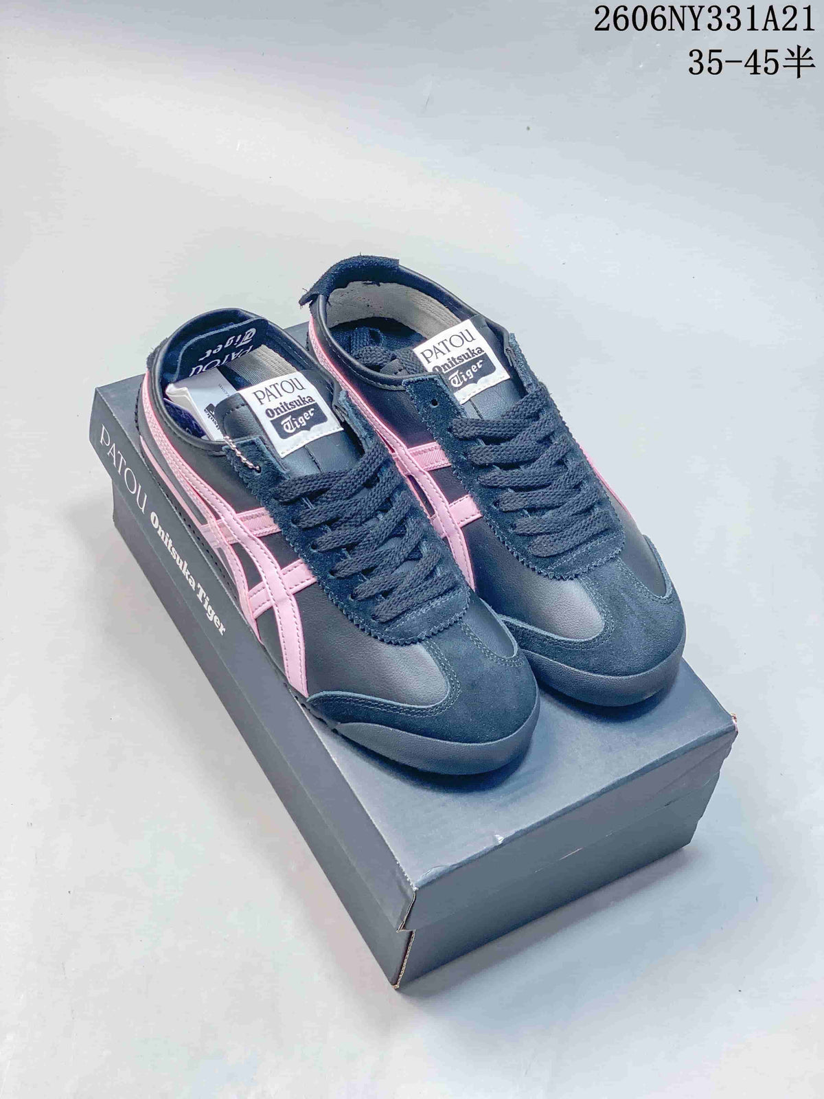 Pair of navy and pink Onitsuka Tiger Mexico 66 Deluxe sneakers on a branded box