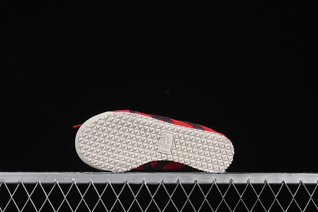 Underside showing the light-colored patterned outsole