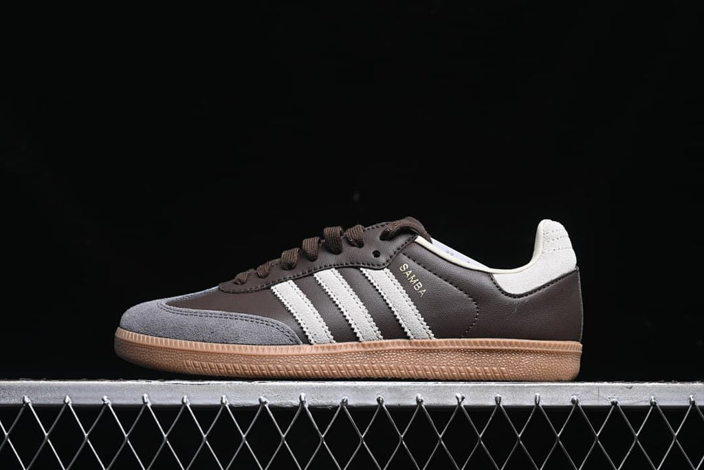 Side view of a brown and grey adidas Samba OG sneaker with off-white stripes and a gum sole