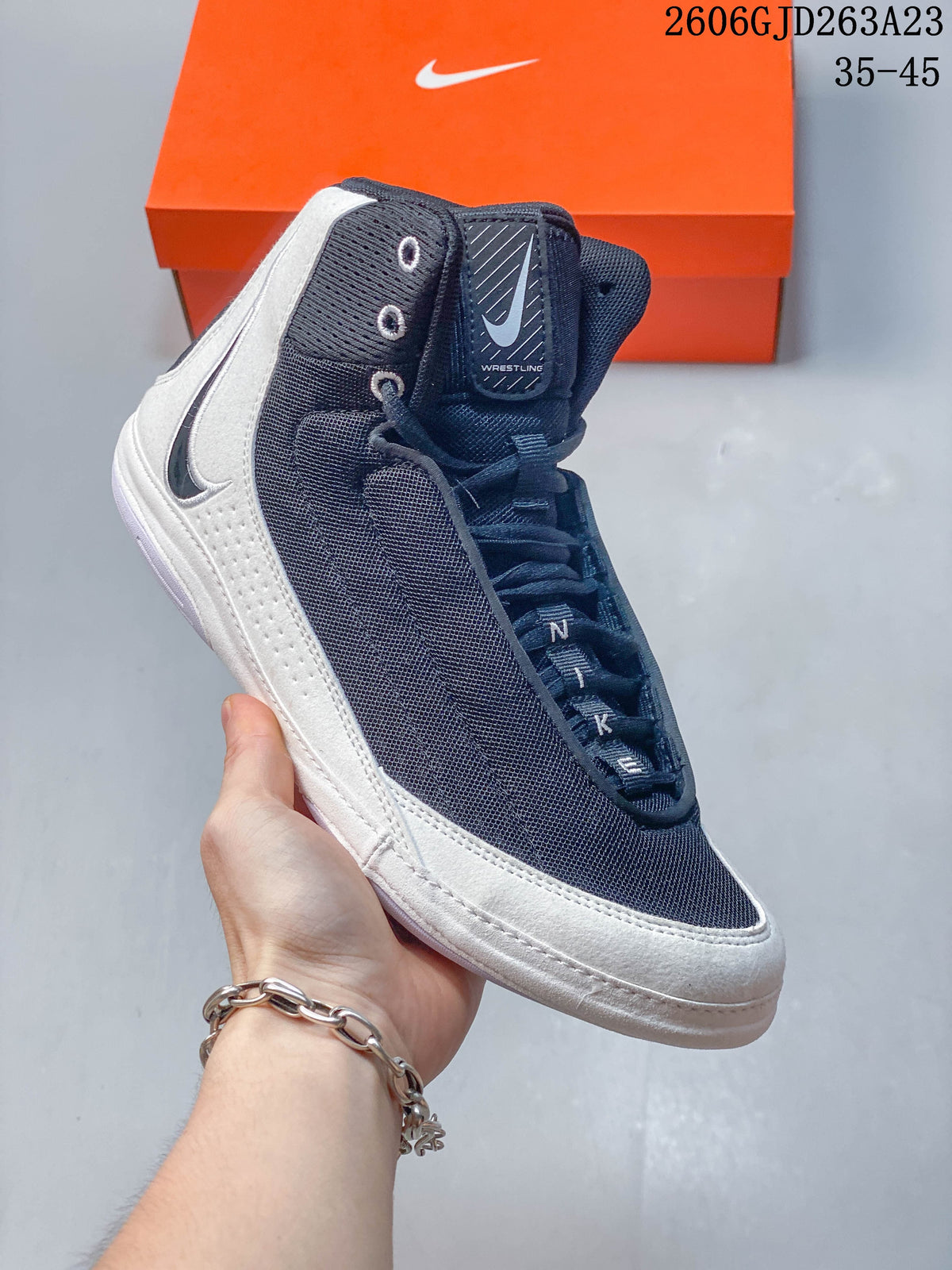 Angled side view showing the high-top design and white overlays