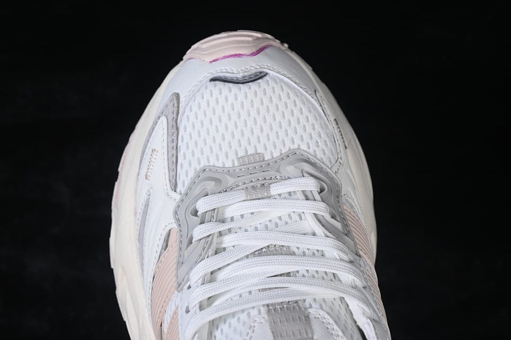 Top-down close-up of the mesh-look toe and white laces