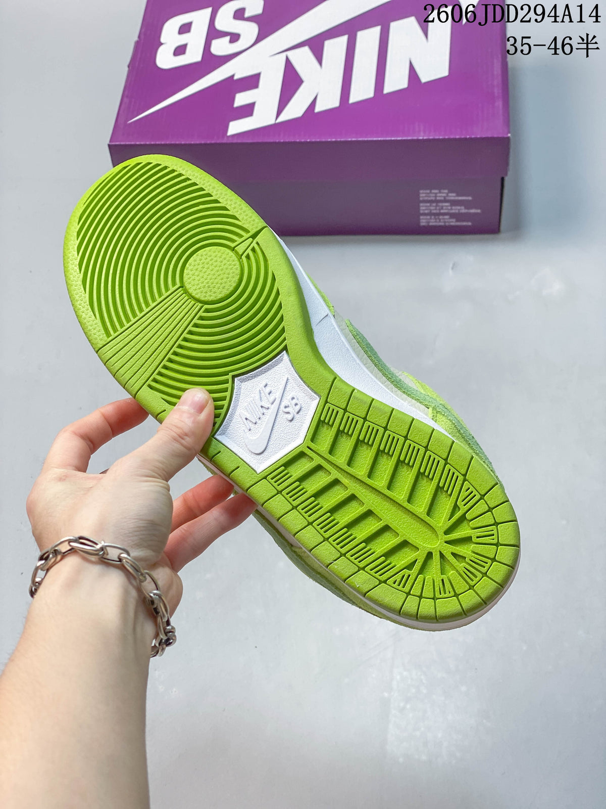 Underside of a Nike SB sneaker showing a green tread outsole