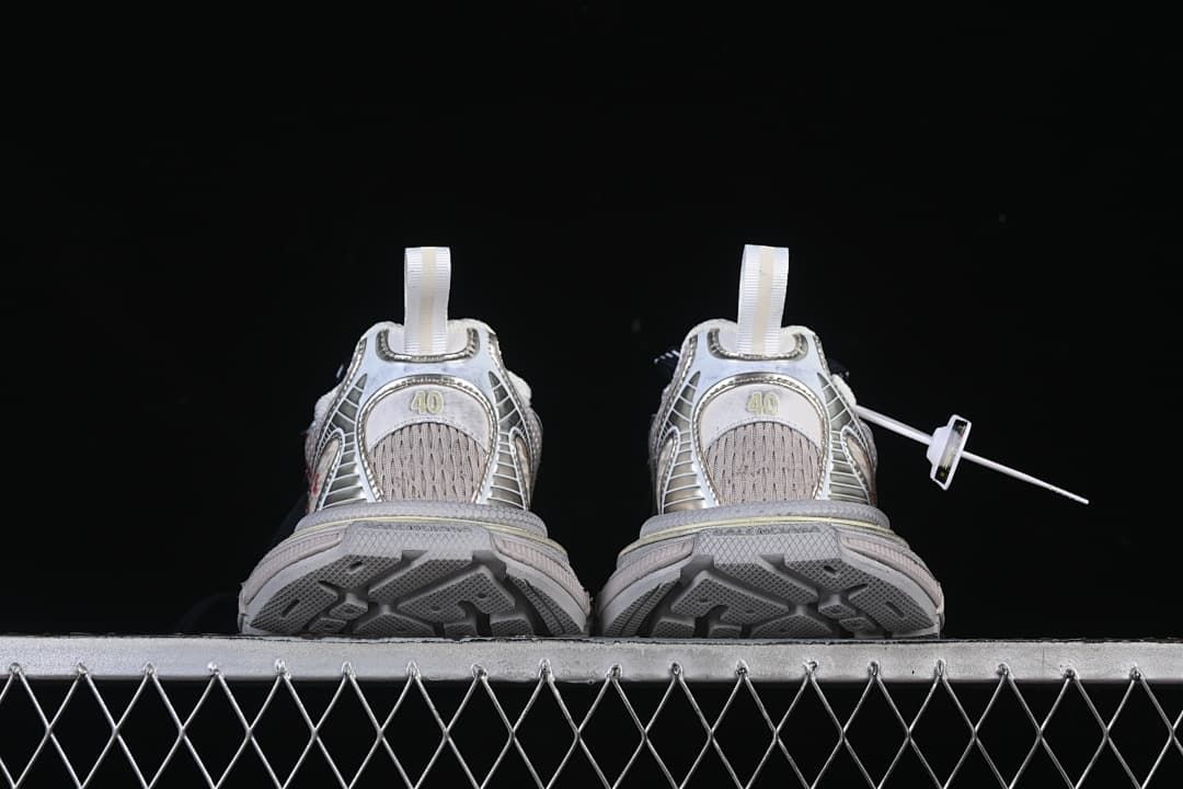 Rear view of the pair showing the heel panels and outsole.