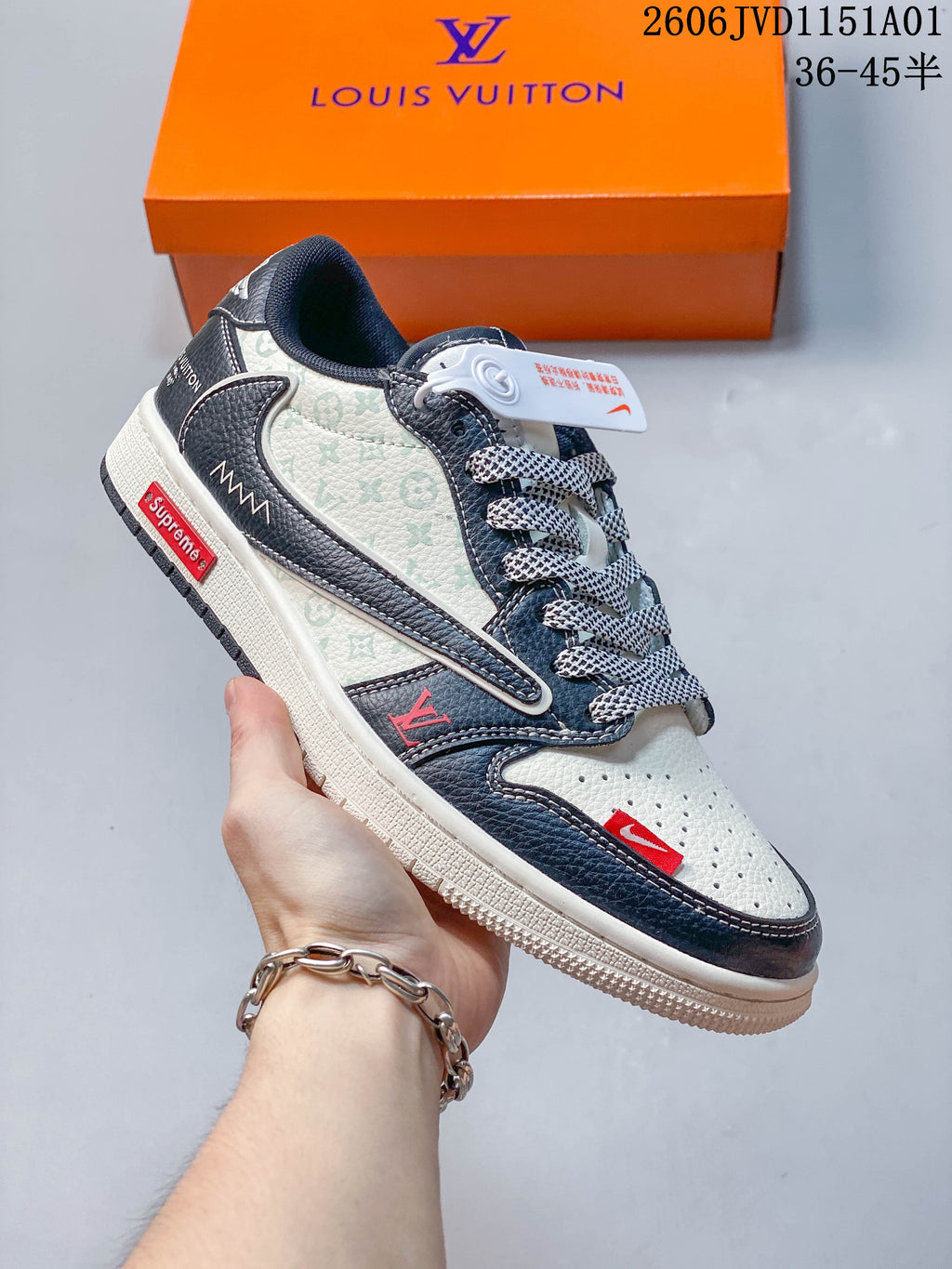 Angled side view of the sneaker with patterned panels and contrasting overlays