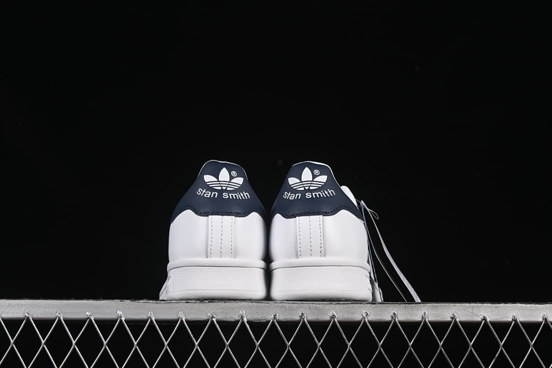 Rear view showing navy heel tabs with Stan Smith lettering.