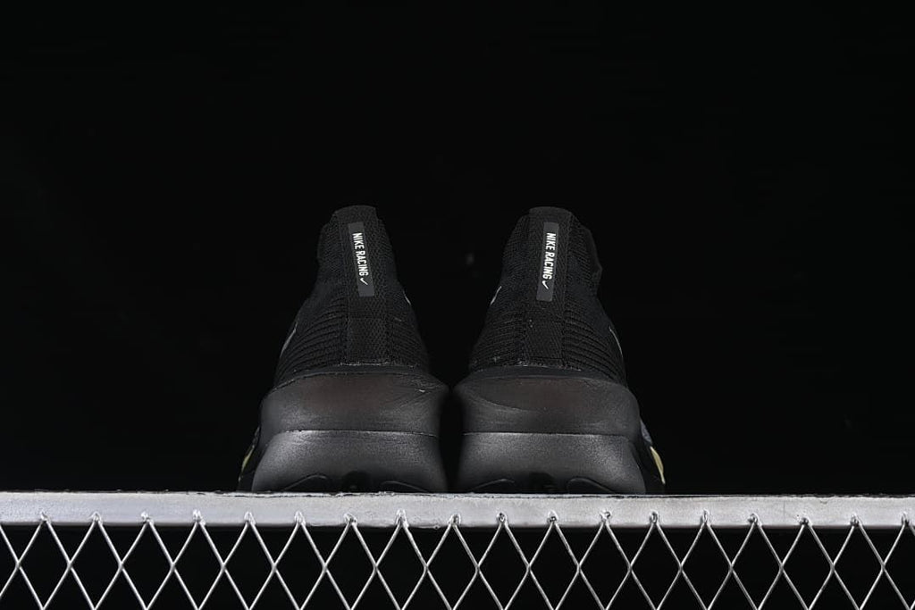 Rear view of the pair showing heel construction and sole