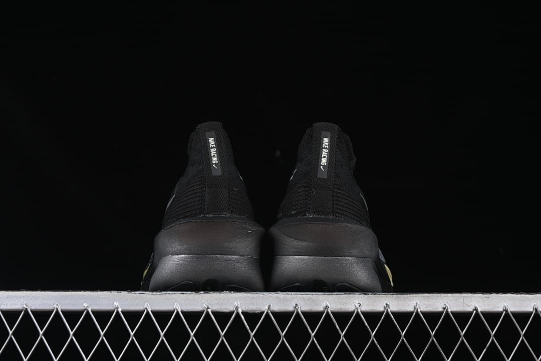 Rear view of the pair showing heel construction and sole