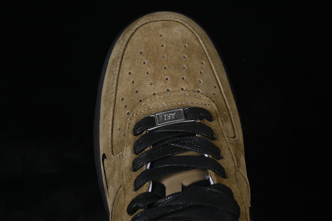 Top-down close-up of the perforated toe and lace area