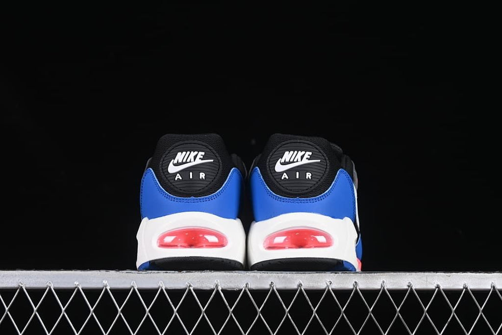 Rear view of both sneakers showing blue heel panels and visible Air units