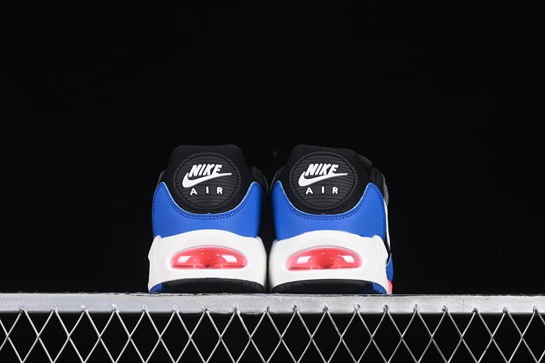 Rear view of both sneakers showing blue heel panels and visible Air units