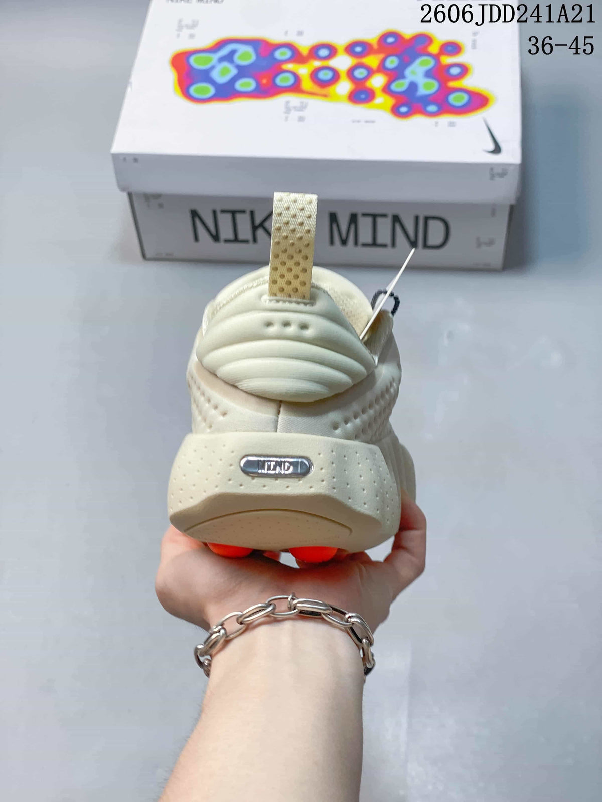 Rear view of a cream Nike Mind sneaker