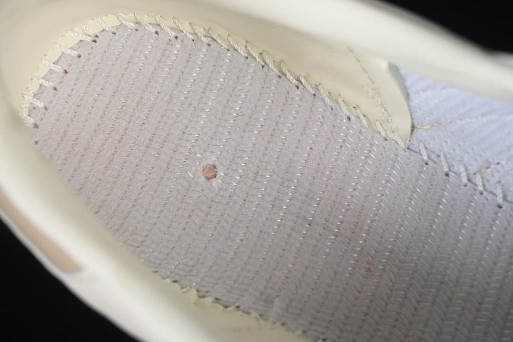 Close-up view inside the sneaker showing stitching and interior construction