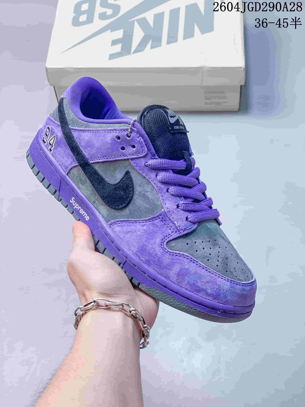 Purple and gray low-top sneaker with dark side detailing