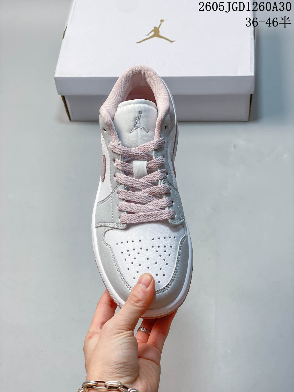 Front view showing the perforated toe and pink laces