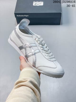 White Mexico 66 sneaker with silver-gray side stripes and tonal gray detailing.