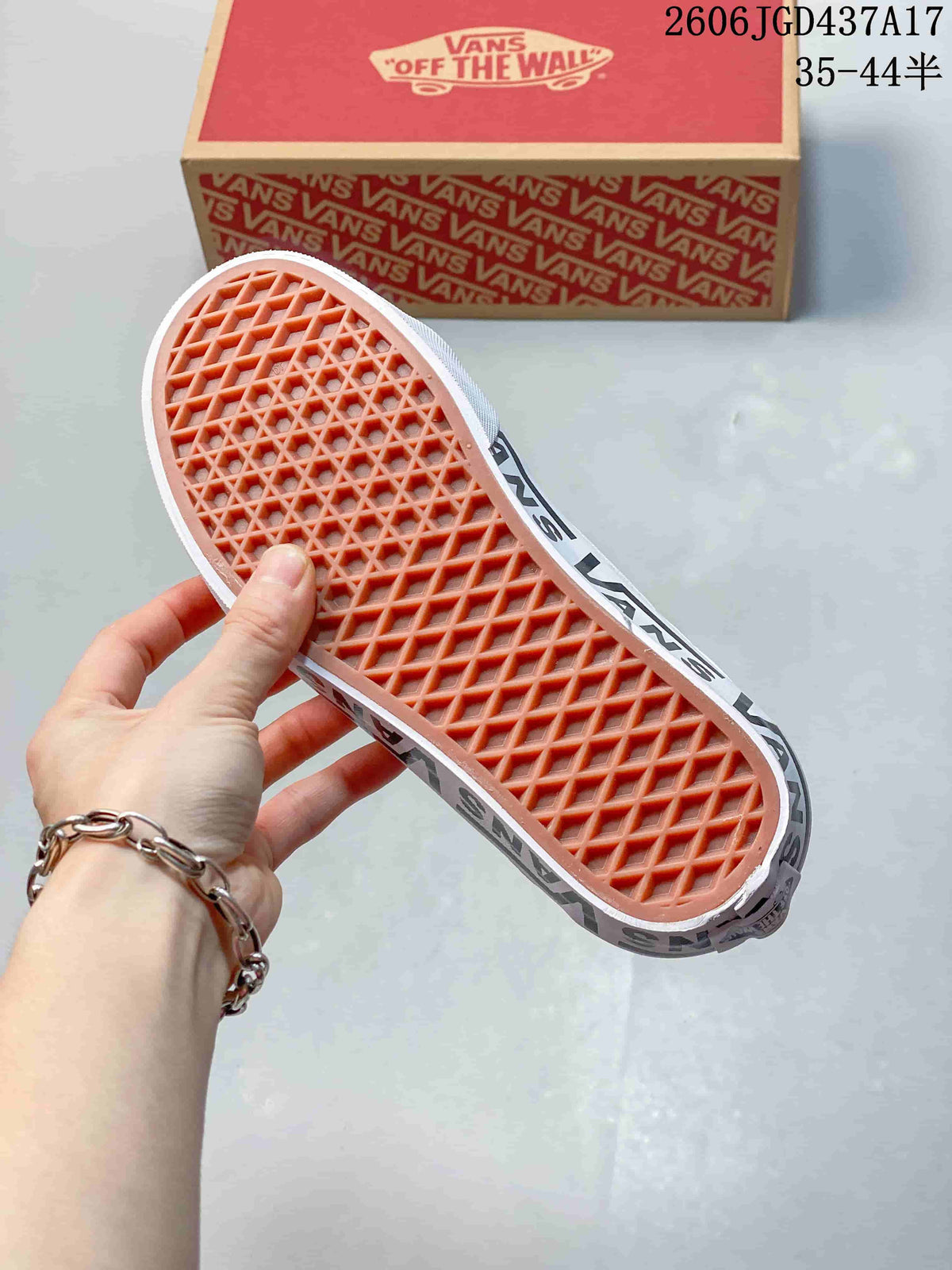 Underside of a Vans sneaker showing the patterned gum-colored outsole.