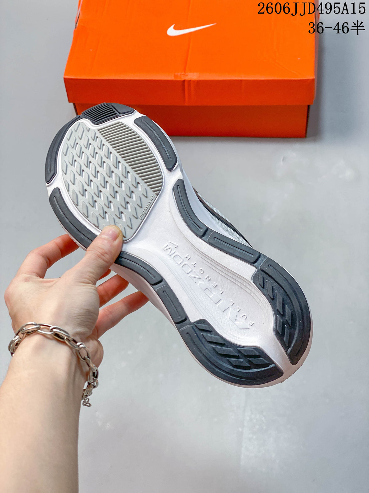 Underside of a Nike running shoe showing its patterned outsole