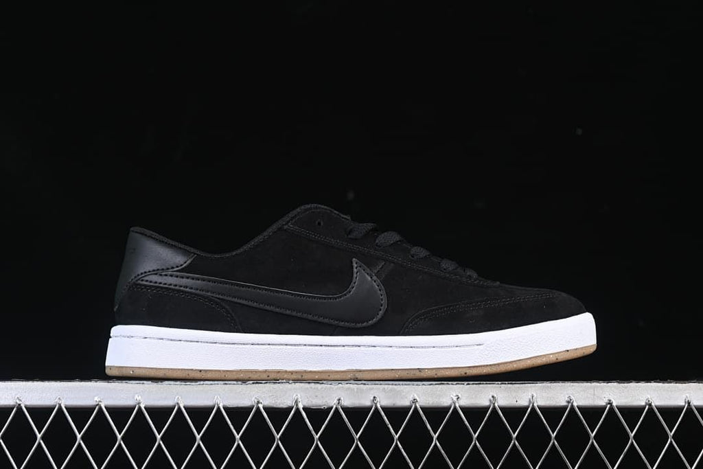 Side profile of a black Nike SB FC Classic shoe with a white midsole and gum outsole.