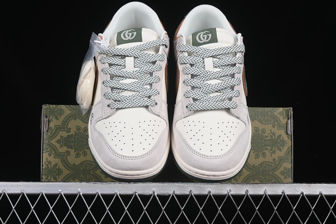 Front view of the pair with patterned laces and perforated toe panels