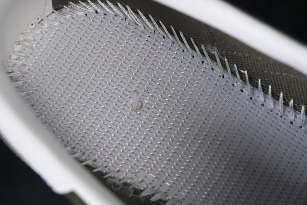 Close-up of the sneaker's interior stitching and upper