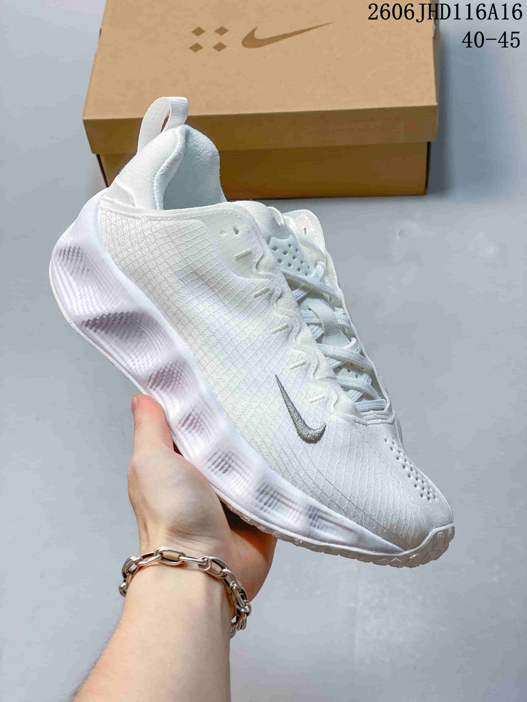 Side view of a white Nike Ava Rover shoe with a textured upper and sculpted outsole.