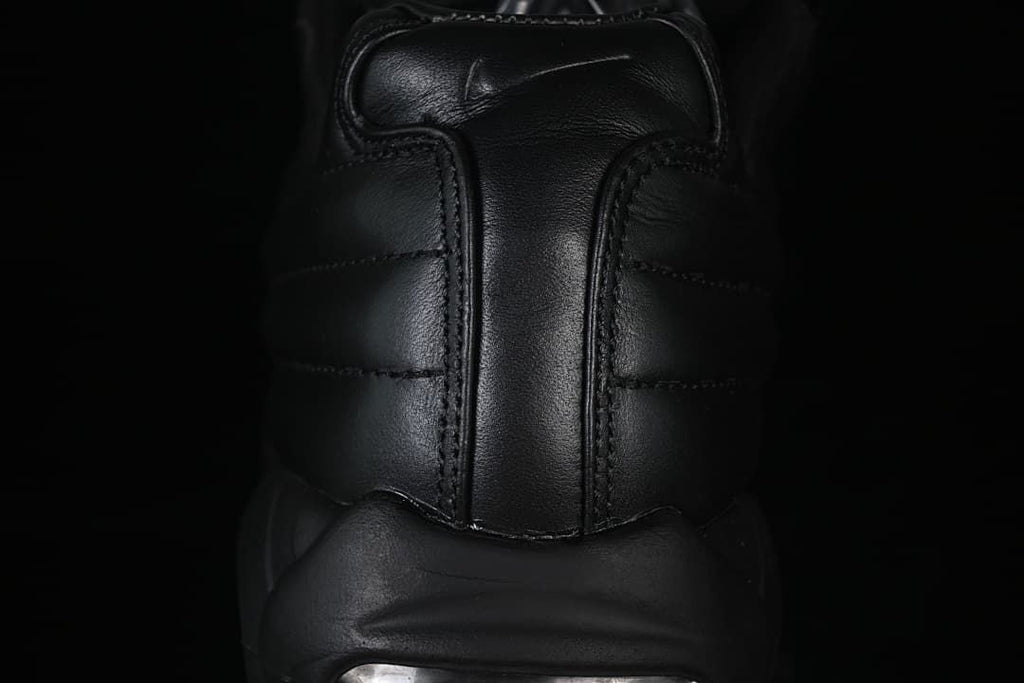 Rear view highlighting the padded heel and stitching