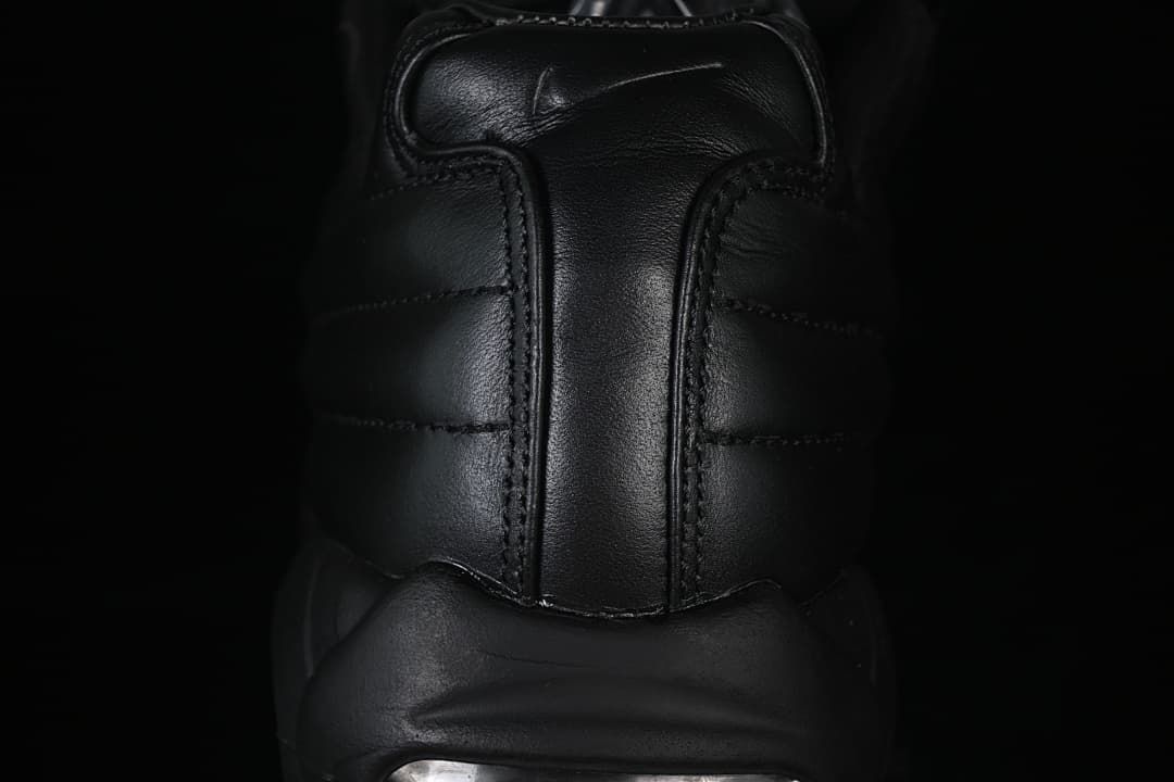 Rear view highlighting the padded heel and stitching