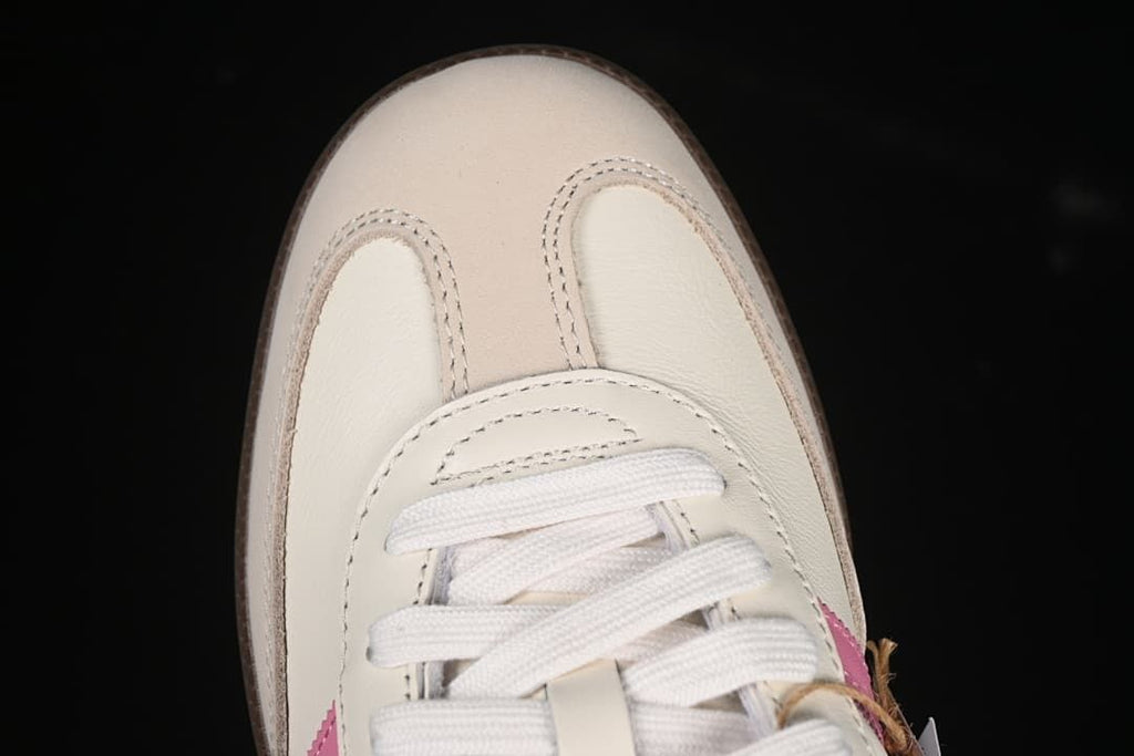 Top-down view of the sneaker toe and white laces
