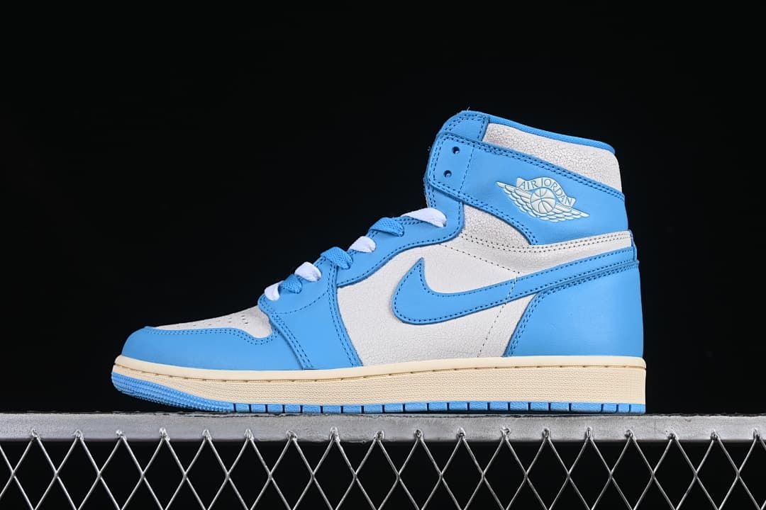 Side view of a blue-and-white Air Jordan 1 High OG sneaker