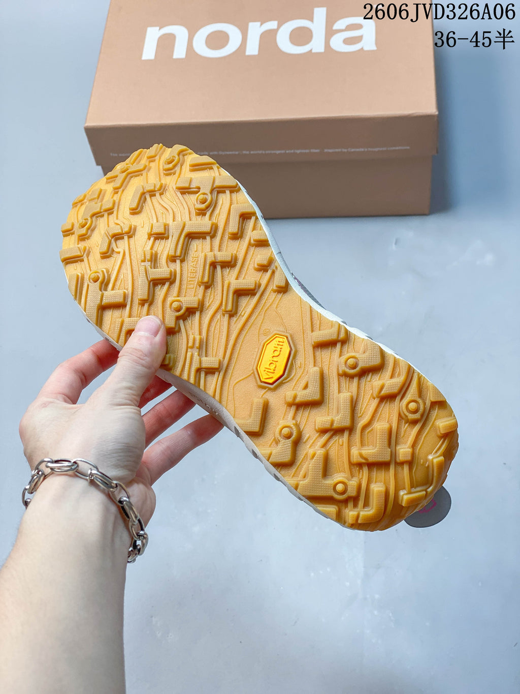 Close-up of the sneaker's yellow lugged outsole.