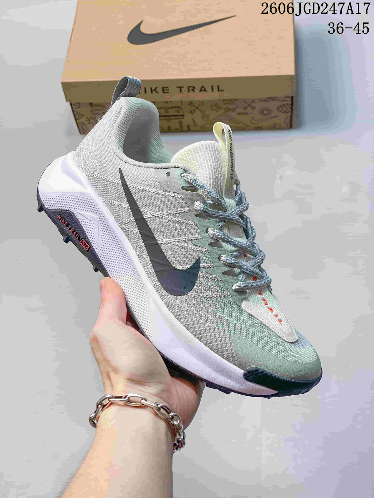 Light gray and pale green Nike Wildhorse 10 trail running shoe