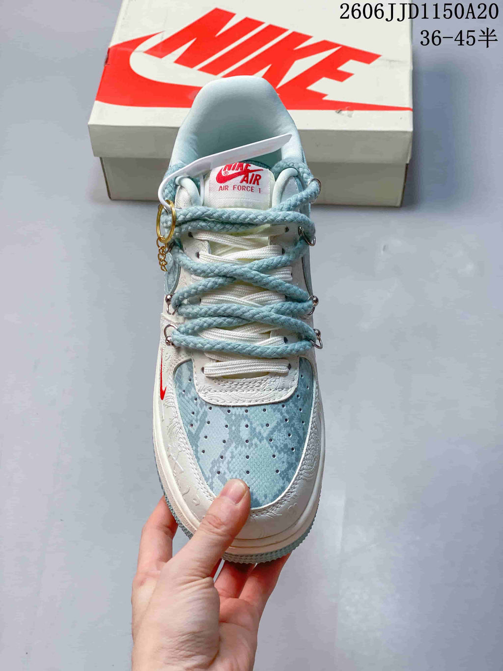 Top view showing the patterned toe, white laces, and decorative rope-style laces