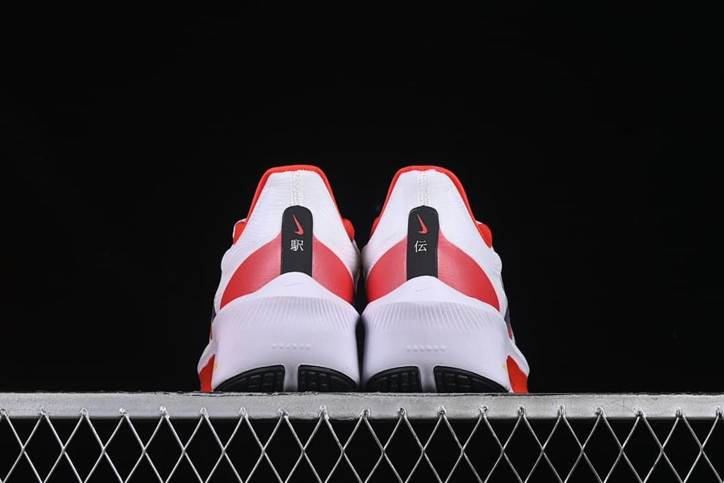 Rear view of the pair with red heel panels and white midsoles