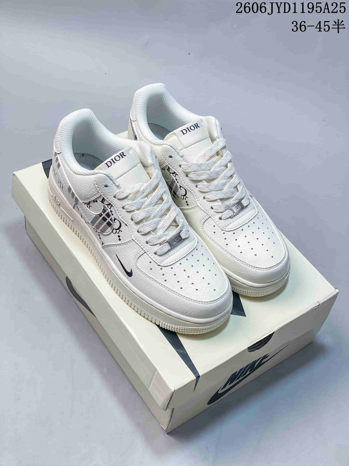 Three graphic low-top sneakers shown from the side in white, red-and-white, and navy-and-white designs