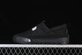 Side view of a black The North Face slip-on shoe with a thick sole