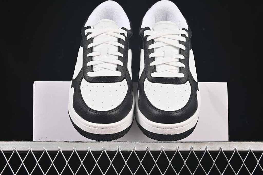 Front view of the pair highlighting the perforated toes and contrasting trim