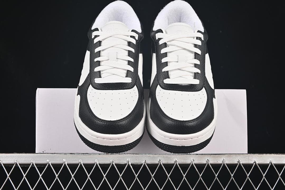 Front view of the pair highlighting the perforated toes and contrasting trim