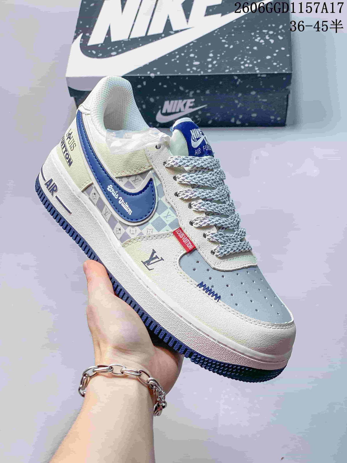 Angled view showing the side-panel print, blue accents, and embroidered details