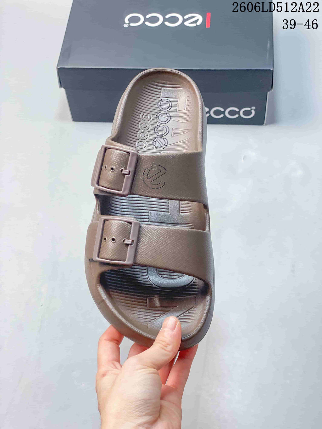 Top view of the sandal showing its open toe, footbed, and two buckles.