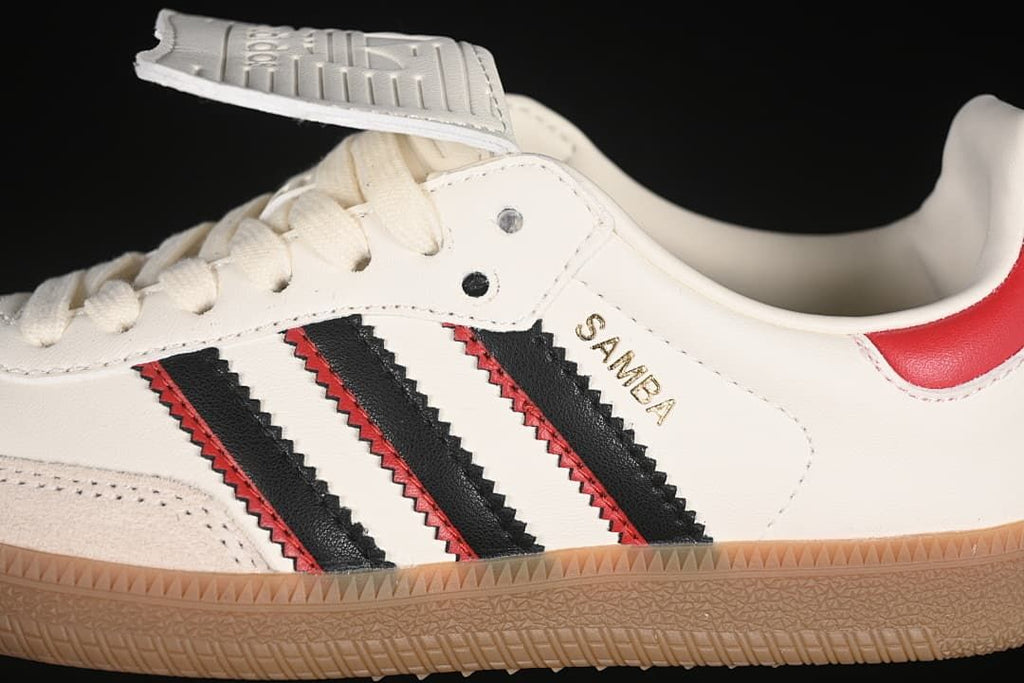 Close-up of the side stripes, Samba lettering, lace area, and gum outsole.