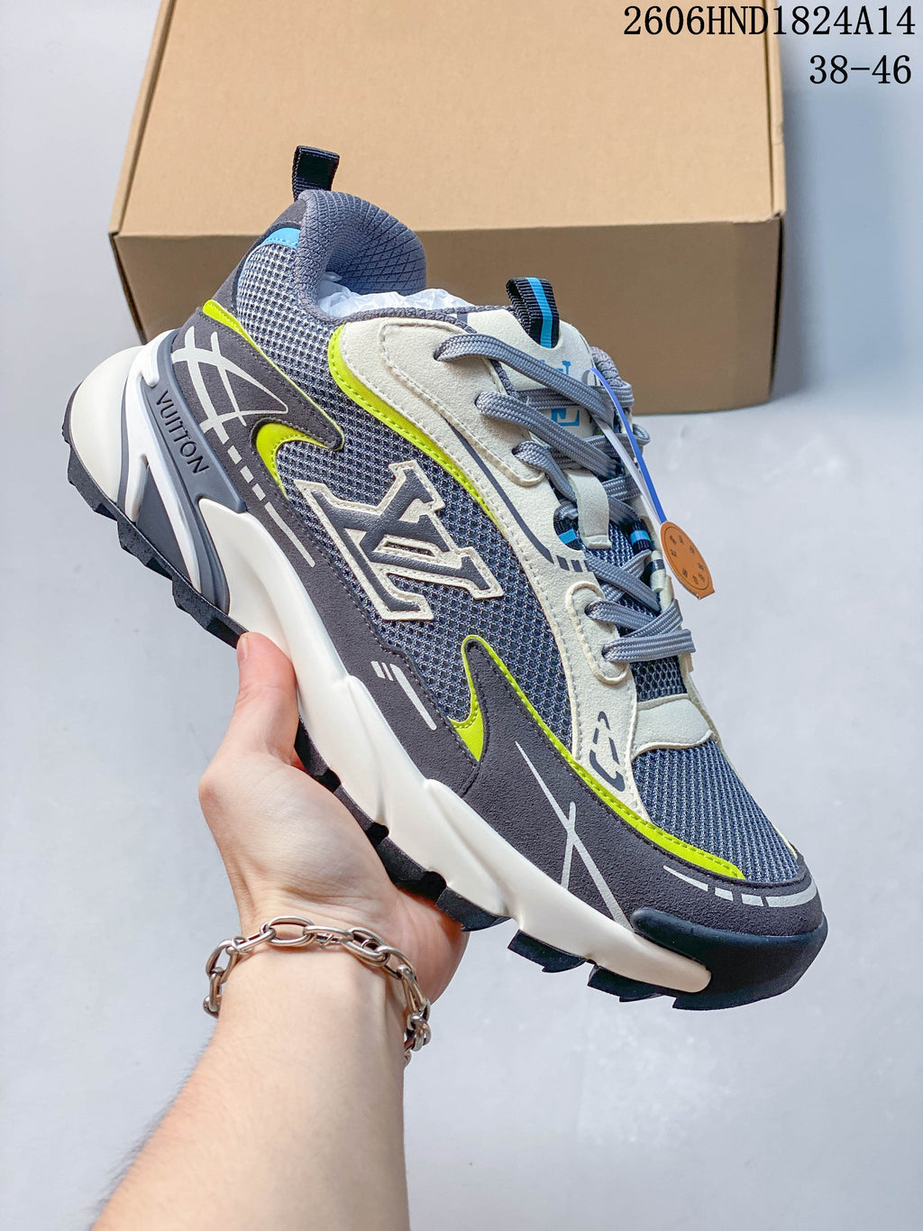 Louis Vuitton Tatic Runner sneaker in gray and navy with neon yellow accents