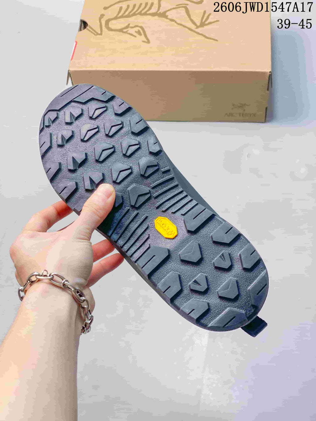 Close-up of the shoe's patterned outsole and tread.