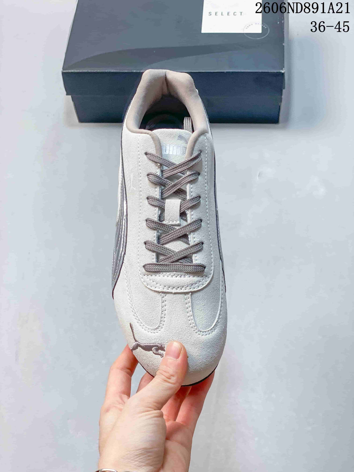 Top view of a light gray Puma Speedcat OG sneaker with gray laces