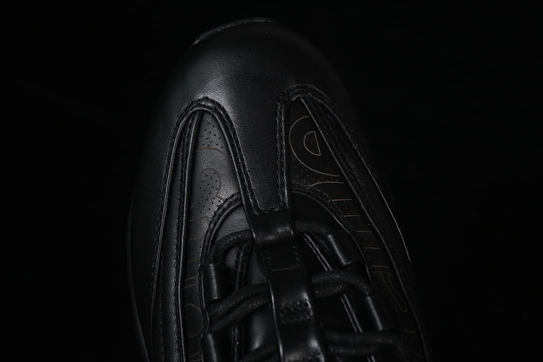 Top view of the black sneaker toe and lace area