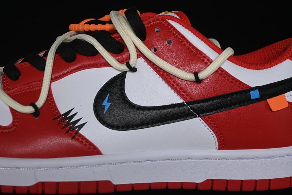 Close-up of the side swoosh and layered red and white panels