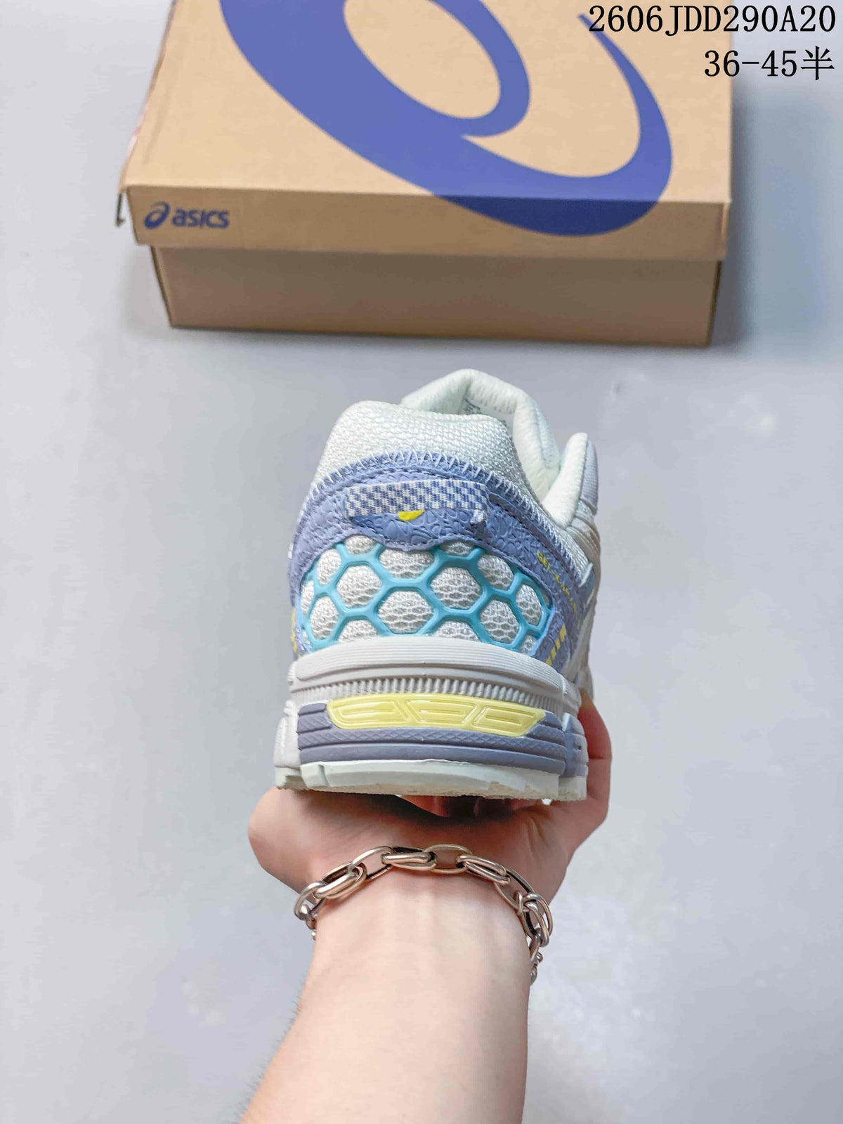 Rear view showing the shoe heel with blue and lavender details.